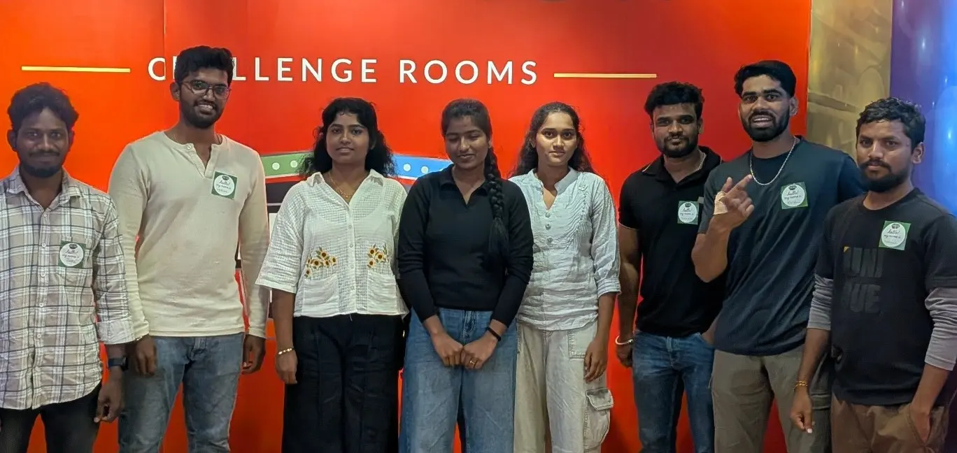 Players lined up in front of the Challenge Rooms wall